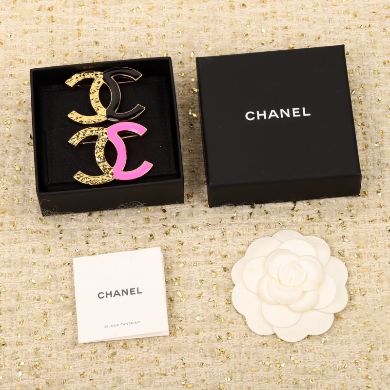 Ch*el brooches